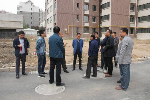 銅煤公司承建的銅煤2#小區(qū)水仙居5、6、7、8#樓順利通過竣工驗收